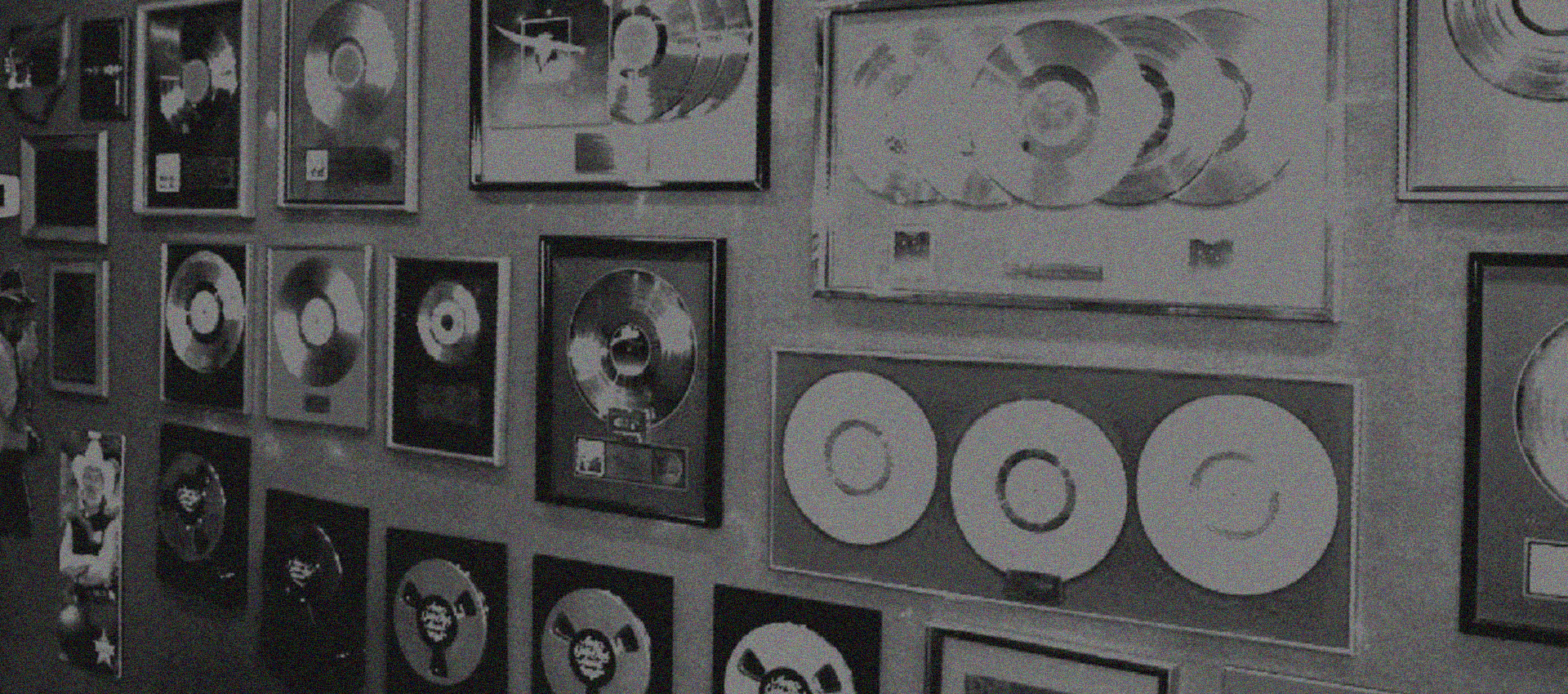 Platinum and gold records on the wall